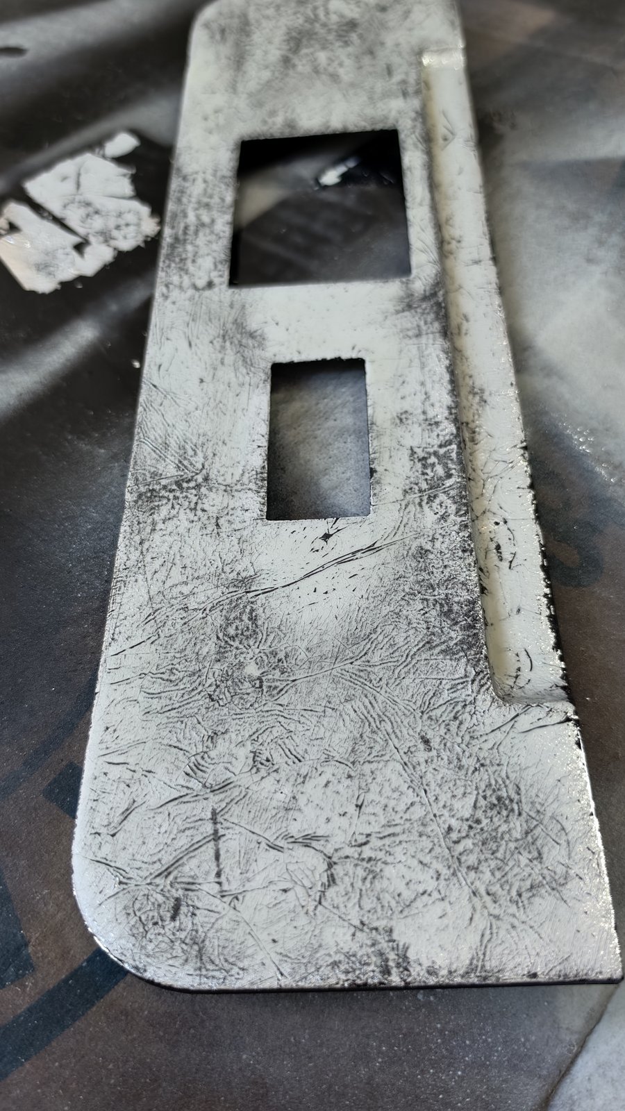 La face avant après la pose de la feuille effet argent